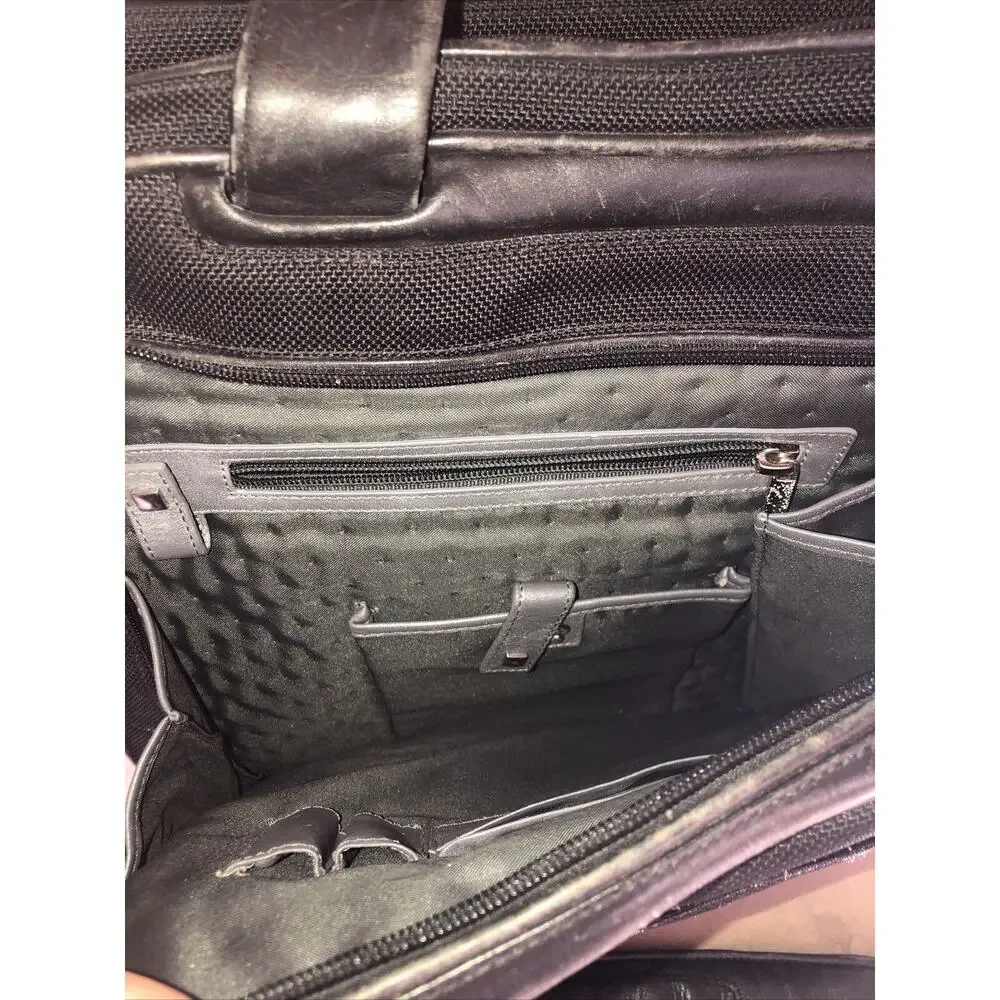 Tumi expandable leather